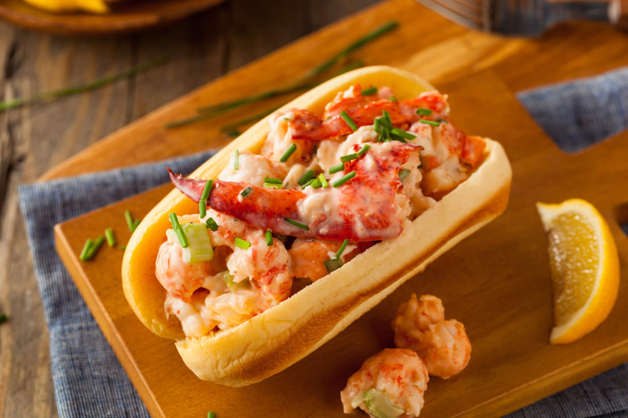 Homemade New England Lobster Roll with Lemons