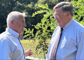 Suffolk County Legislator Jim Mazzarella, left, speaks with Suffolk County Executive Ed Romaine