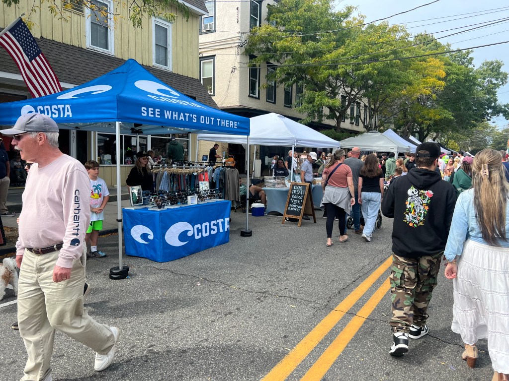 People crowd the streets at the East End Seaport Museum Maritime Festival