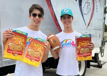 Jett and Luke Justin at Tackle Hunger Cereal Drive