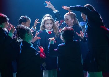 Matilda (Sadie Mathers) and Company in Matilda The Musical at Theatre Three