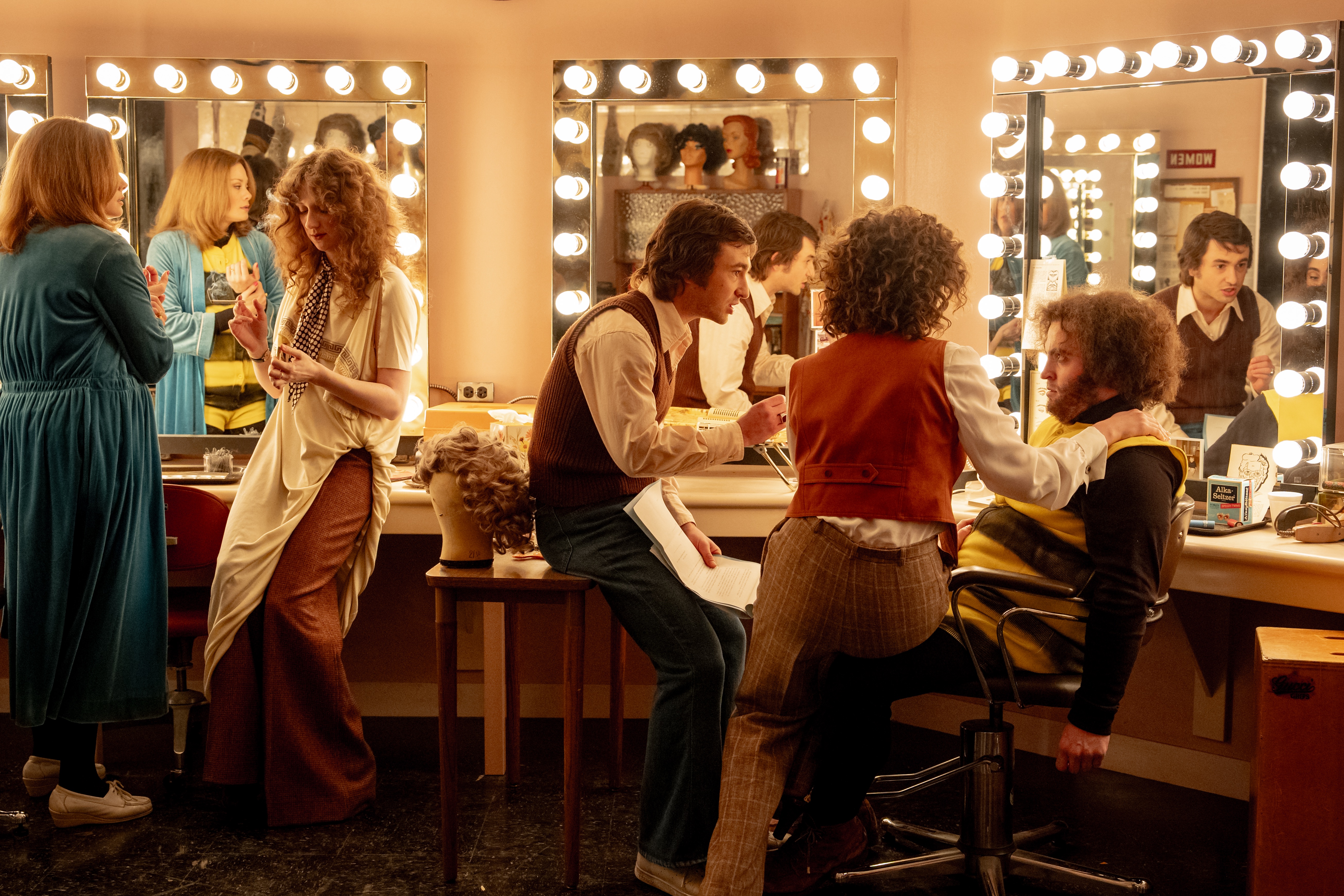 Jane Curtin (Kim Matula), Laraine Newman (Emily Fairn), Lorne Michaels (Gabriel LaBelle), Rosie Shuster (Rachel Sennott), and John Belushi (Matt Wood) in the Makeup Room in "Saturday Night" at HIFF 2024 Hamptons International Film Festival