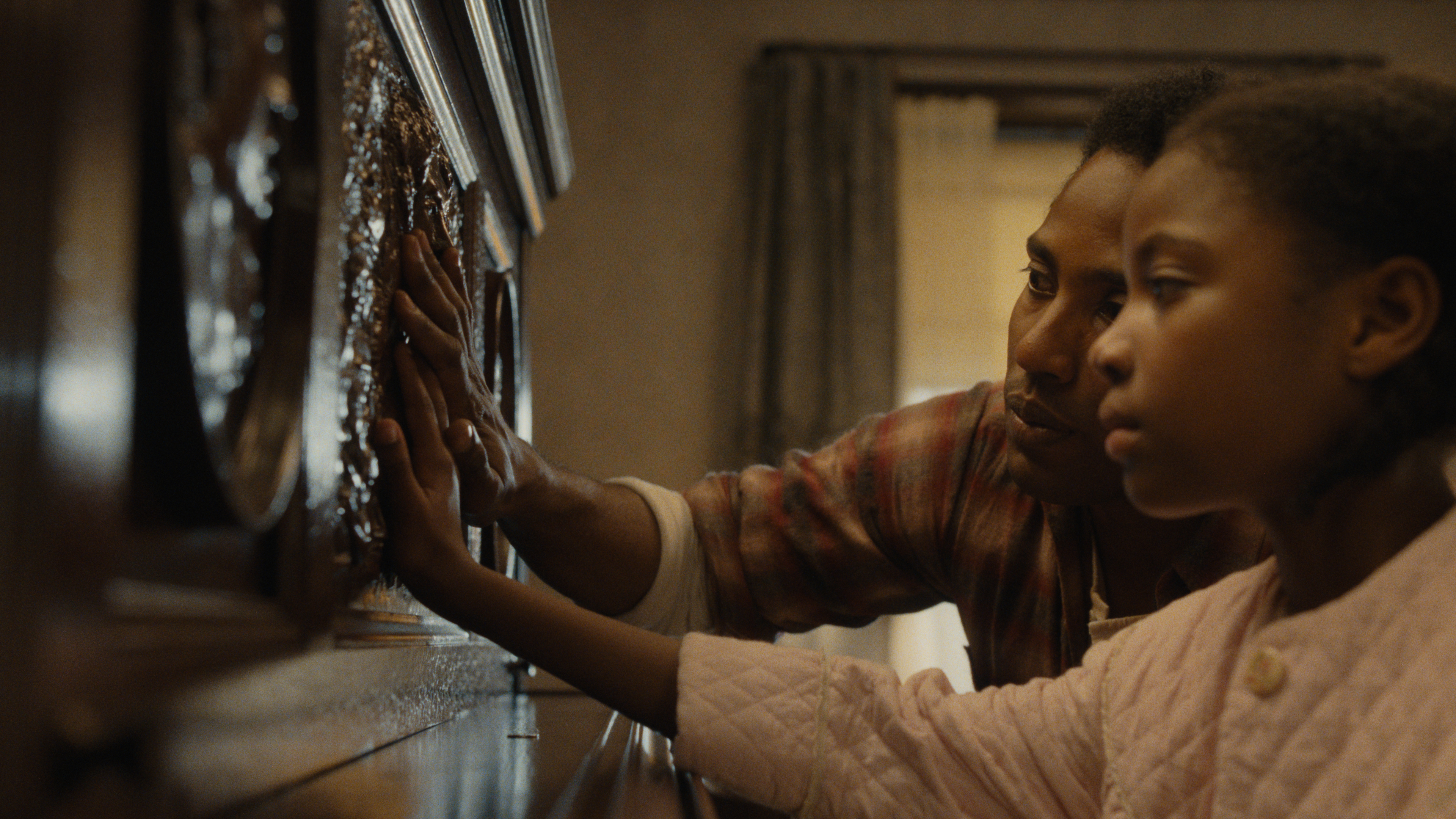 "The Piano Lesson" (L-R) John David Washington as Boy Willie and Skylar Smith as Maretha in The Piano Lesson. Cr. Courtesy of Netflix - at HIFF 2024 Hamptons International Film Festival