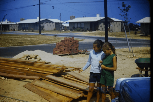 1965 in Culloden Shores:  fencing and patio materials are delivered in Montauk