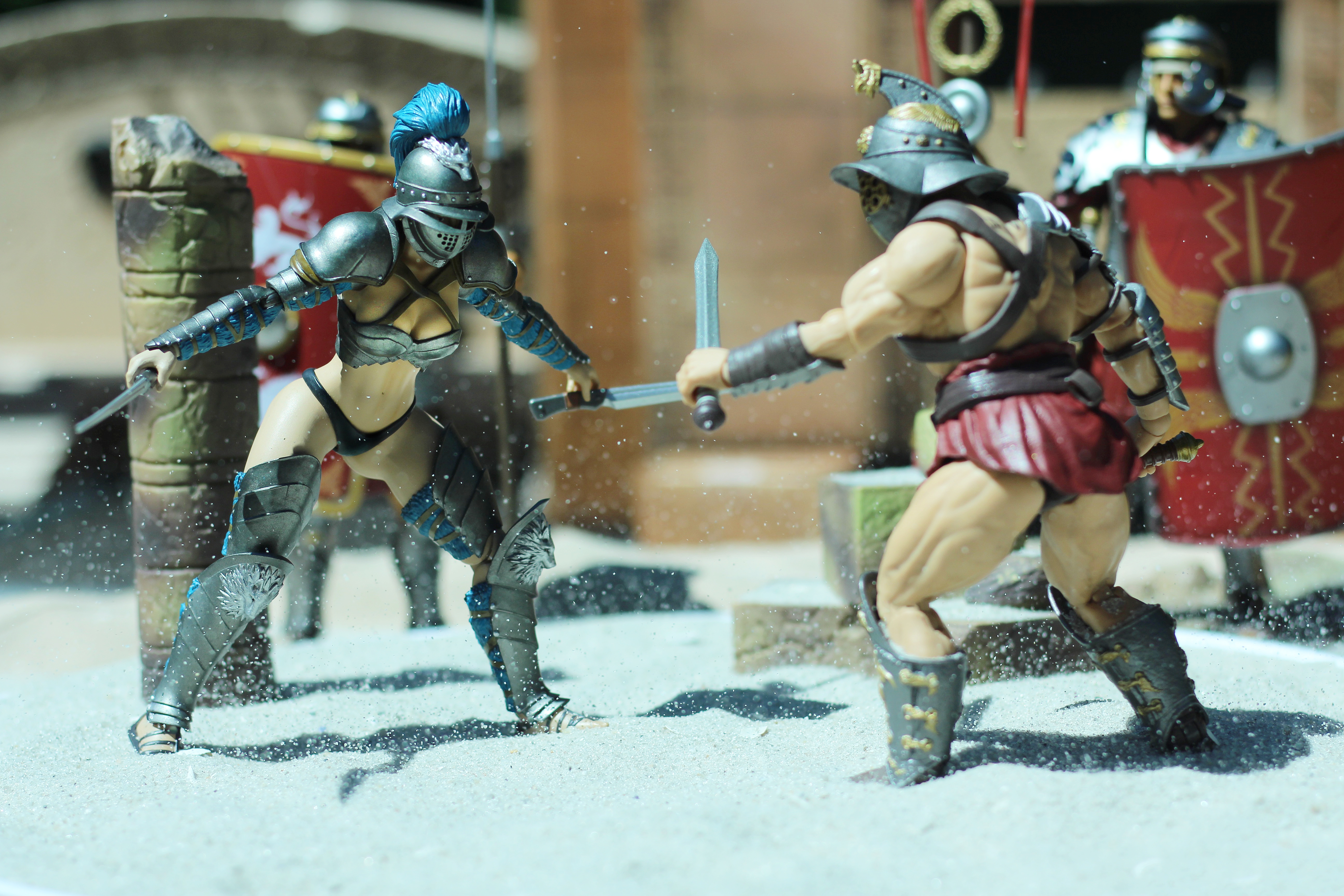 Xesray Studio Combatants as gladiators with sand and a variety of diorama pieces, toy photography by Oliver Peterson, oliversees