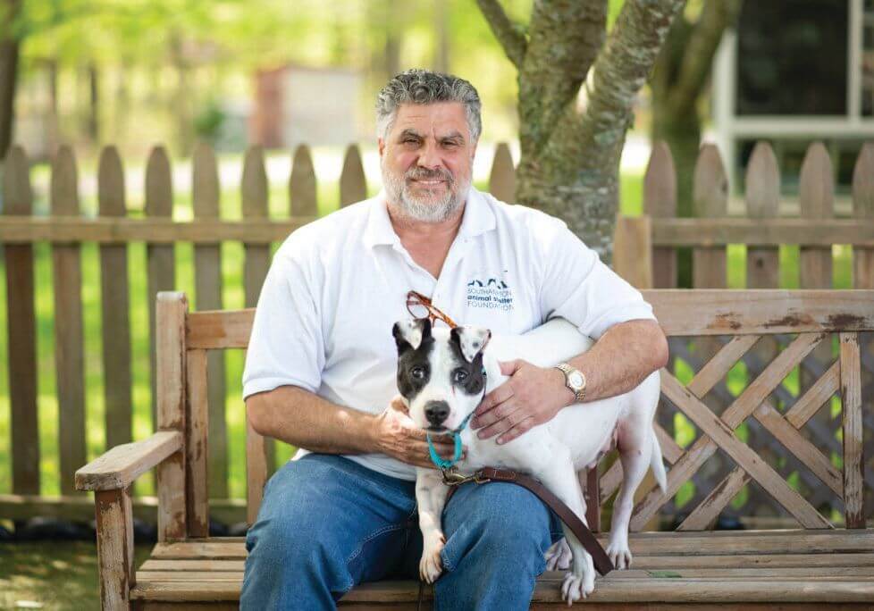 Southampton Animal Shelter Executive Director Anthony Sabia and a dog named Sampson.