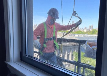 NYC construction worker climbs up to say hi.