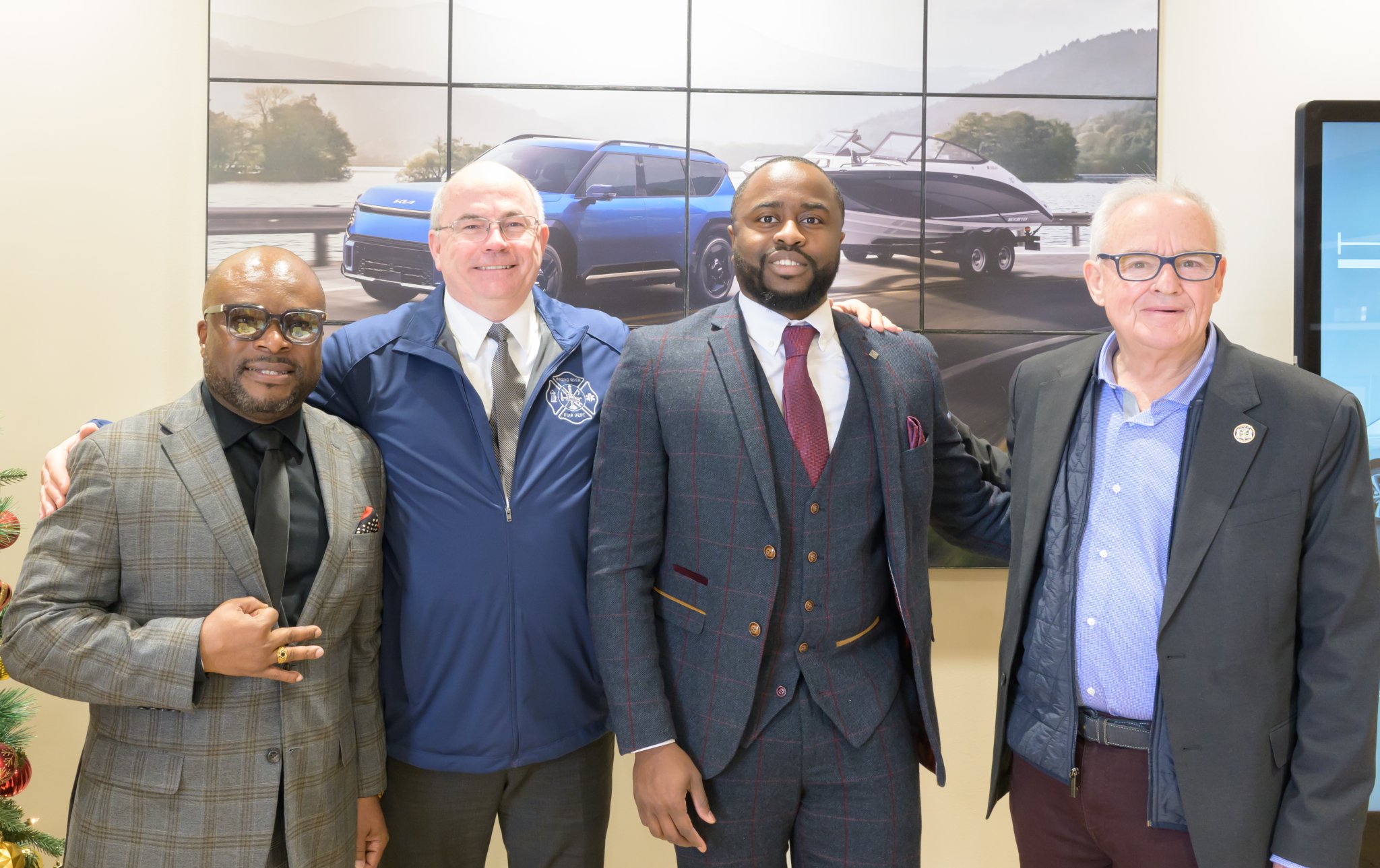 Sammy Orih, Councilman Ken Rothwell, Adonia McCormack, Councilman Bob Kern at Eagle Kia in Riverhead