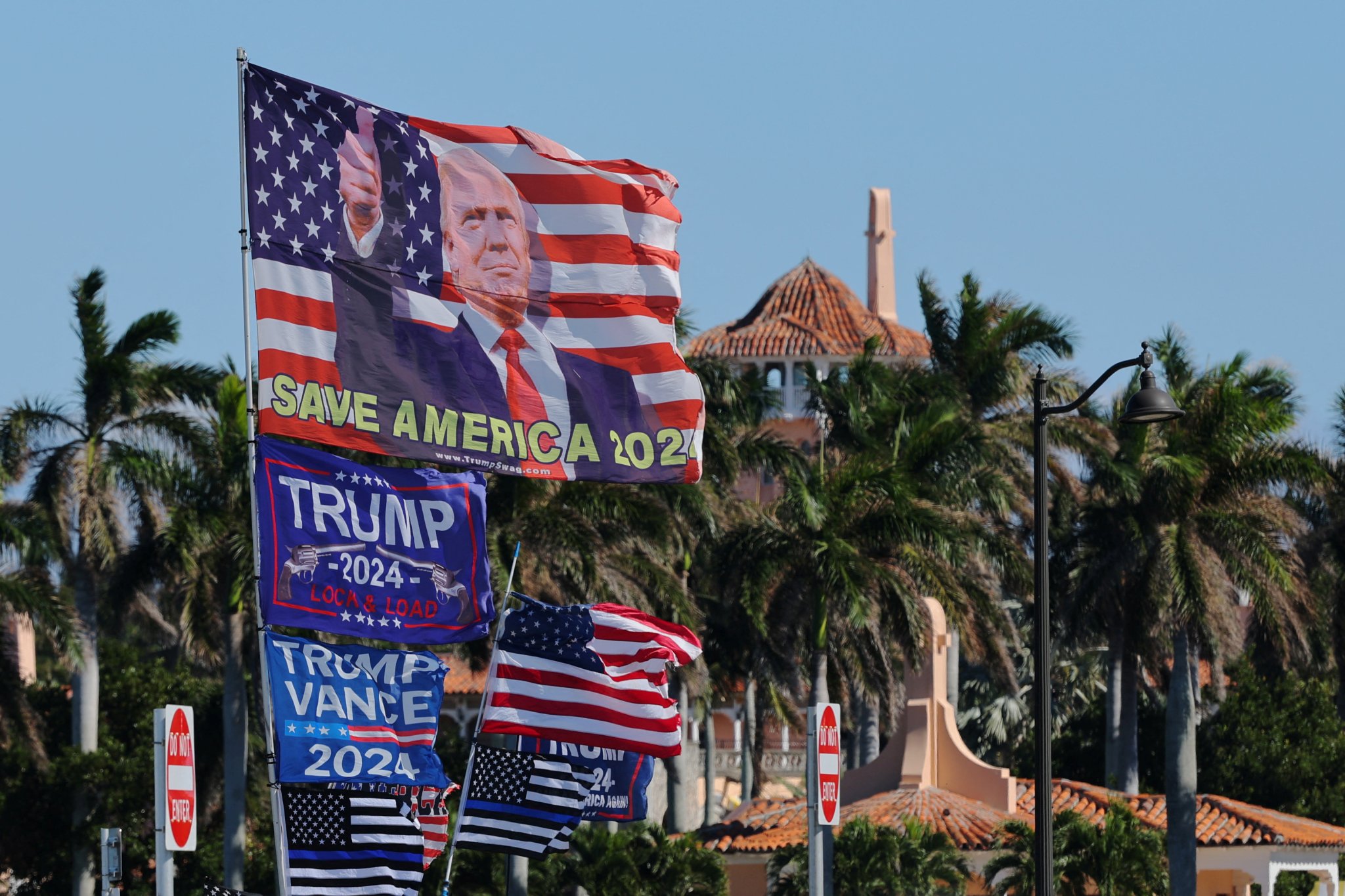 Supporters gather outside U.S. President-elect Donald Trump's residence at Mar-a-Lago in Palm Beach, Florida, U.S., December 3, 2024