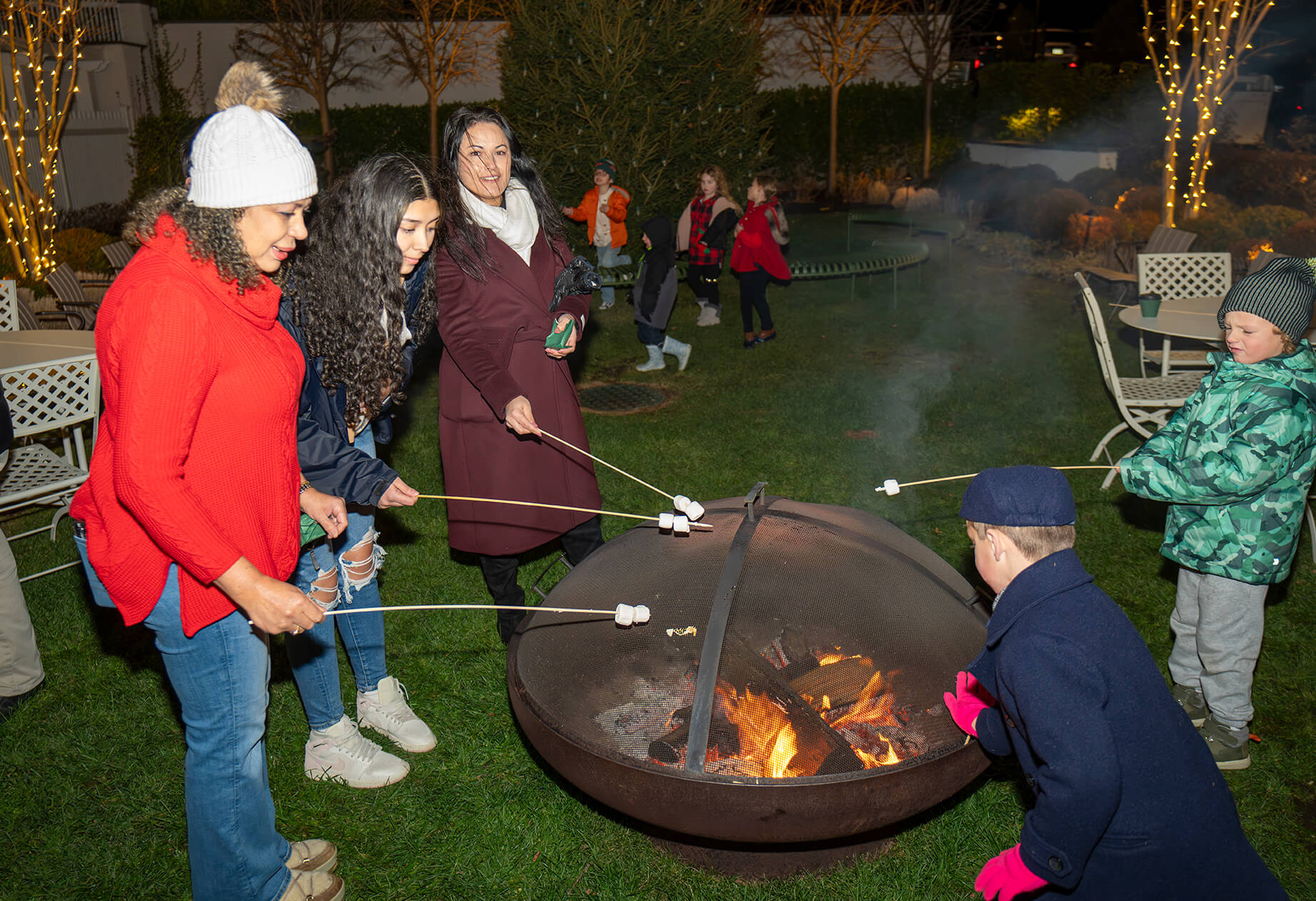 Making delicious s'mores at Canoe Place