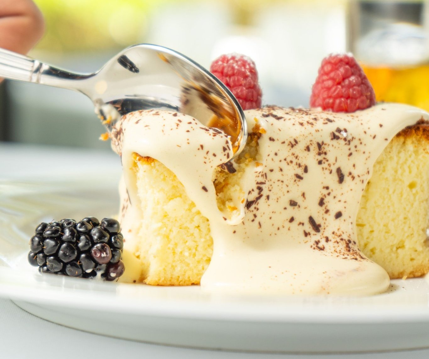 Italian ricotta cheese cake served with sabayin and fresh berries.