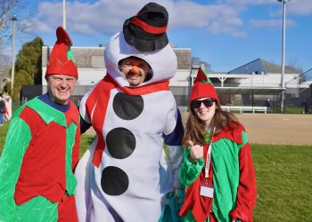 EH Village Frosty Alexis Martinez with Elves Tyler Pond and Lauren Oltoughlin at East Hampton