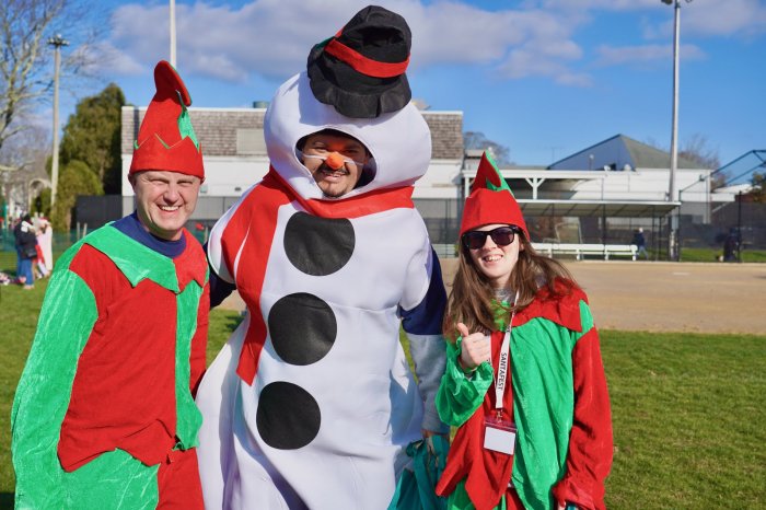 EH Village Frosty Alexis Martinez with Elves Tyler Pond and Lauren Oltoughlin at East Hampton