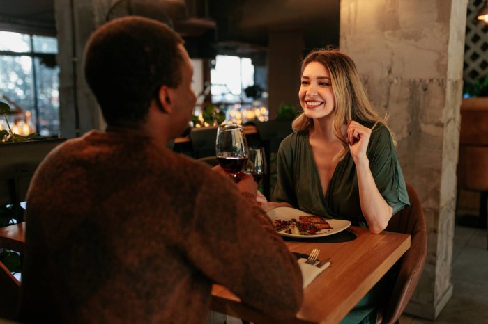 Happy woman on date with boyfriend.