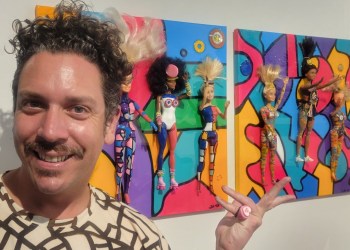 Dylan Smith with his art at the Loves Gallery booth in the 2023 Hamptons Fine Art Fair
