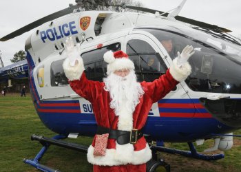 Santa arrives via helicopter!